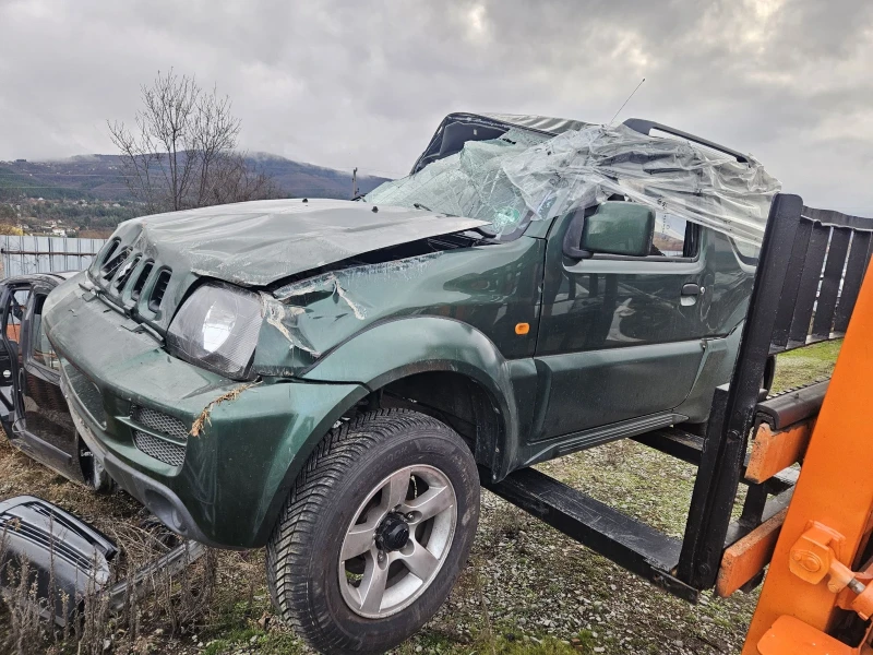 Suzuki Jimny 1.3i, снимка 4 - Автомобили и джипове - 48336887