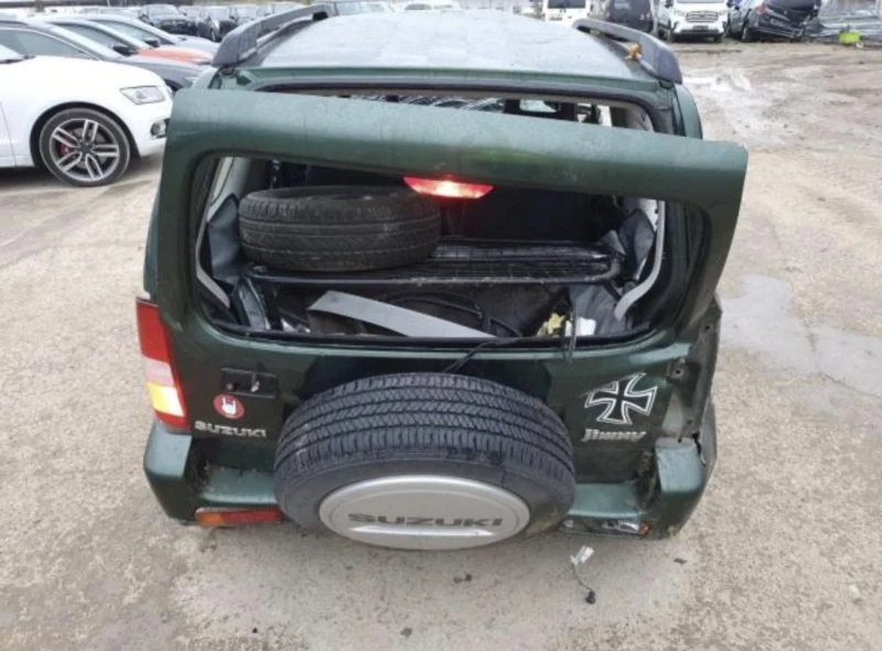 Suzuki Jimny 1.3i, снимка 14 - Автомобили и джипове - 48336887