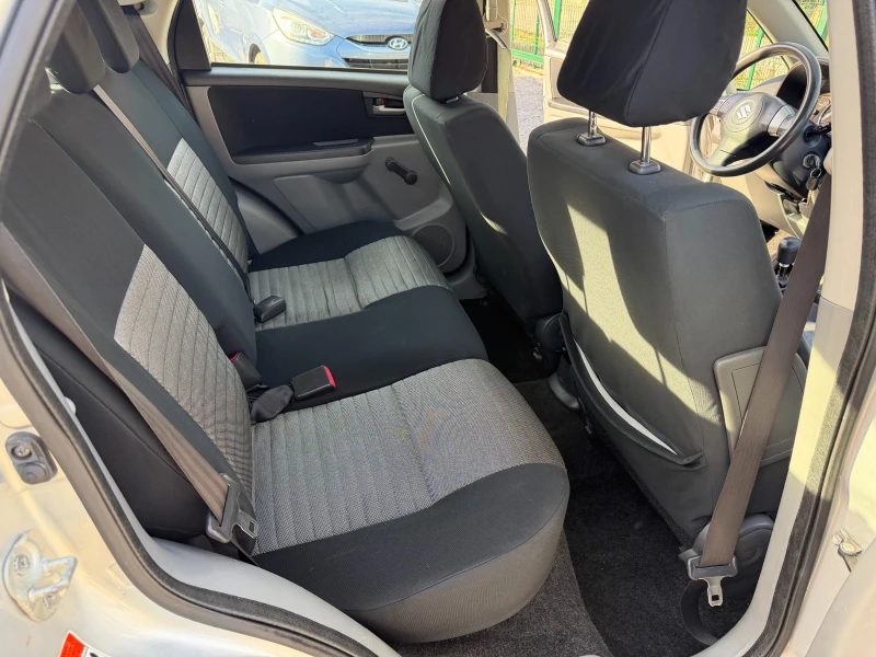 Suzuki SX4 1.6i 4x4 ITALIA, снимка 14 - Автомобили и джипове - 52822781