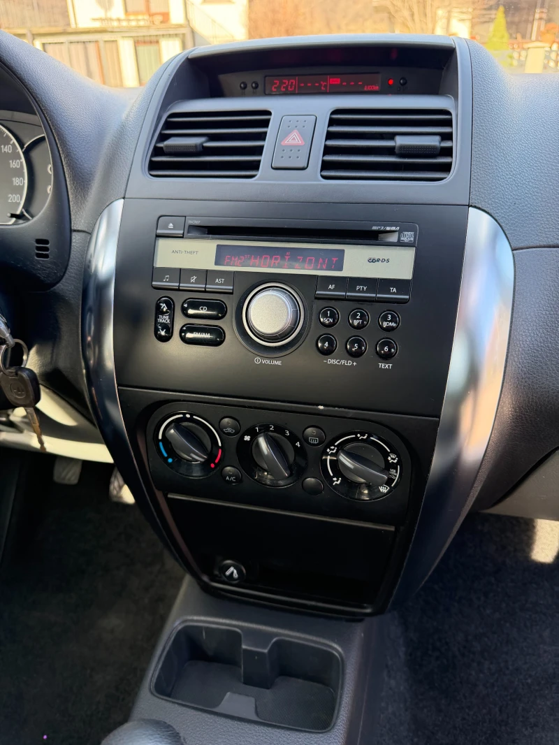 Suzuki SX4 1.6i 4x4 ITALIA, снимка 12 - Автомобили и джипове - 52822781