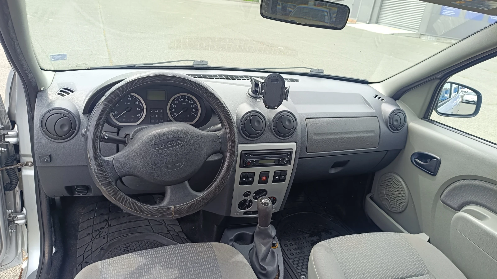 Dacia Logan, снимка 12 - Автомобили и джипове - 54412440