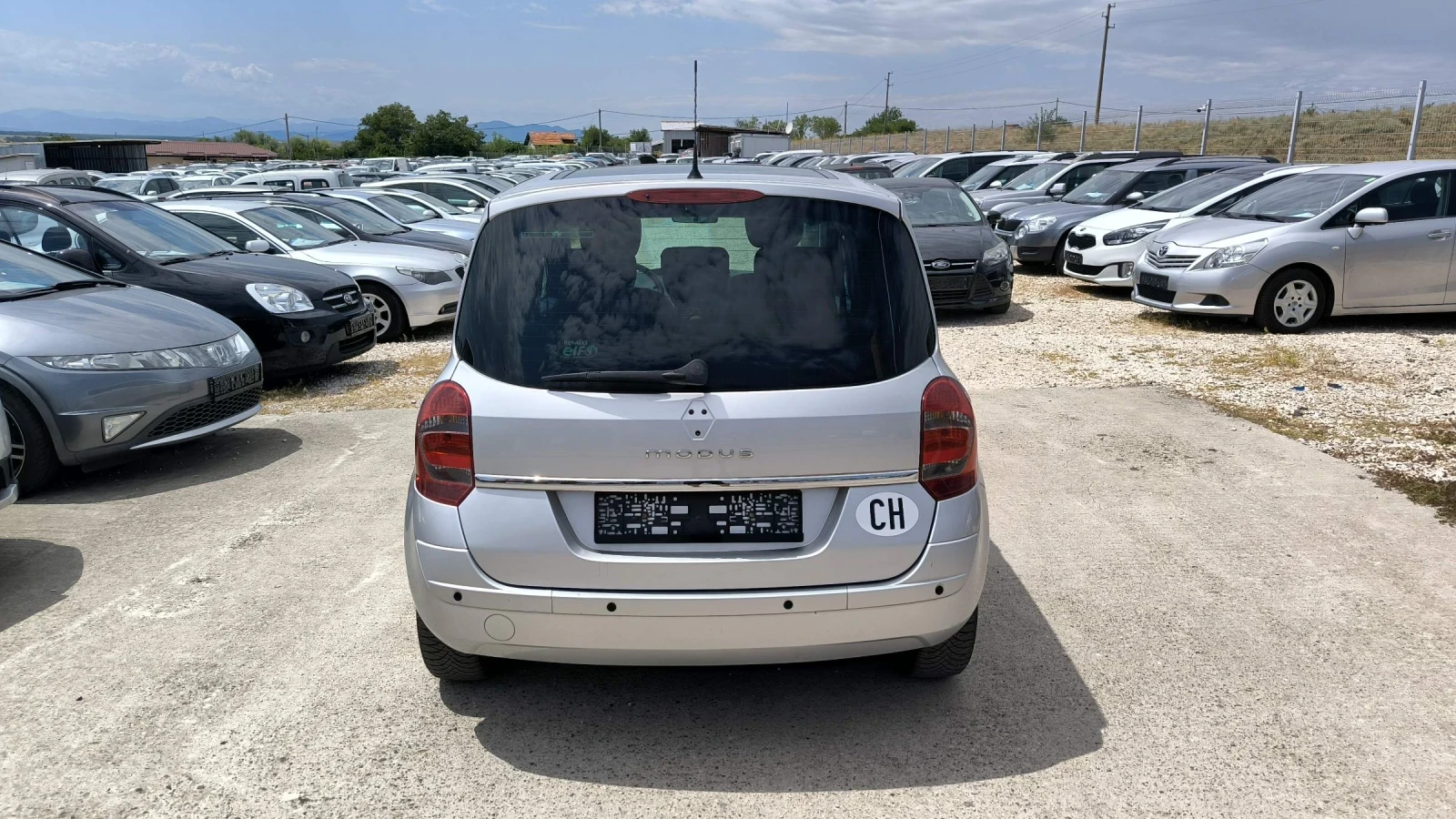 Renault Modus 1.2i, снимка 5 - Автомобили и джипове - 55431748