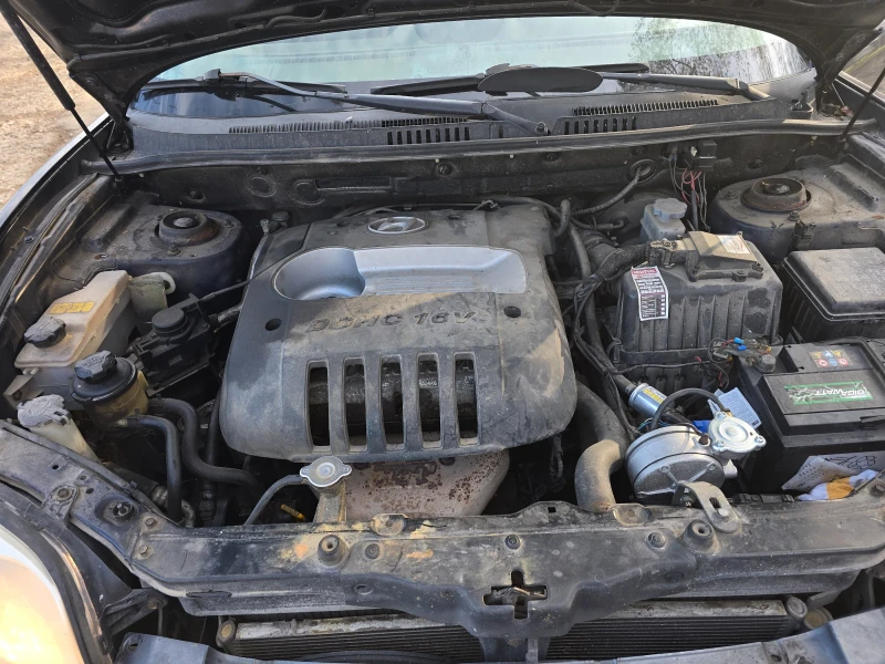 Hyundai Santa fe 2.4 4х4 ГАЗОВ ИНЖЕКЦИОН, снимка 12 - Автомобили и джипове - 52856728