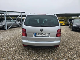 VW Touran 2, 0 TDI АВТОМАТ !! ОБСЛУЖЕН !!! - 7750 лв. / 3962.51 € - 43646886 4