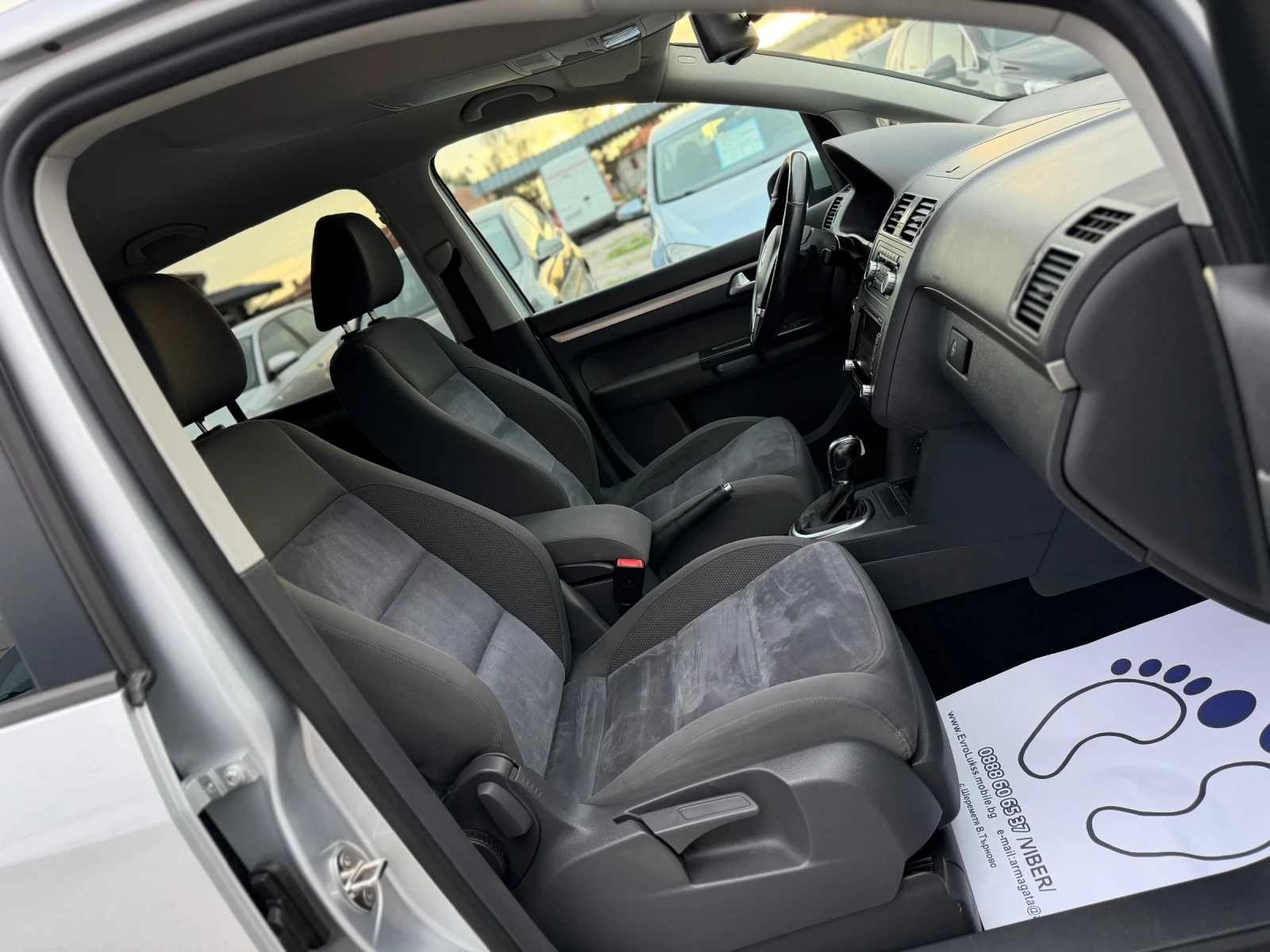 VW Touran 2.0TDI 140кс 7-места DSG НАВИ КАМЕРА, снимка 14 - Автомобили и джипове - 56271082