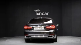 BMW 750 * ТЕЛЕВИЗОРИ* ДИСТРОНИК* 360КАМ* ОБДУХВАНЕ* , снимка 3
