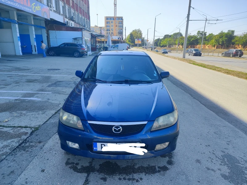 Mazda 323, снимка 11 - Автомобили и джипове - 47315032