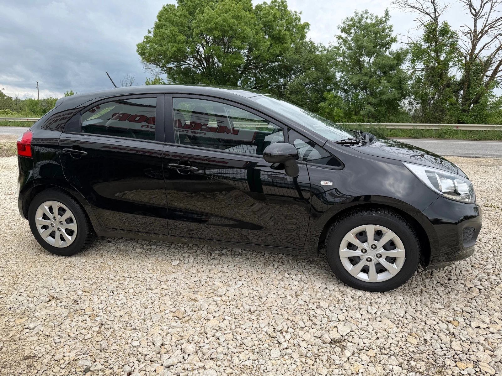 Kia Rio 1.25i 16v/85p.s-klima/5 vrati-Euro 5, снимка 8 - Автомобили и джипове - 54662094