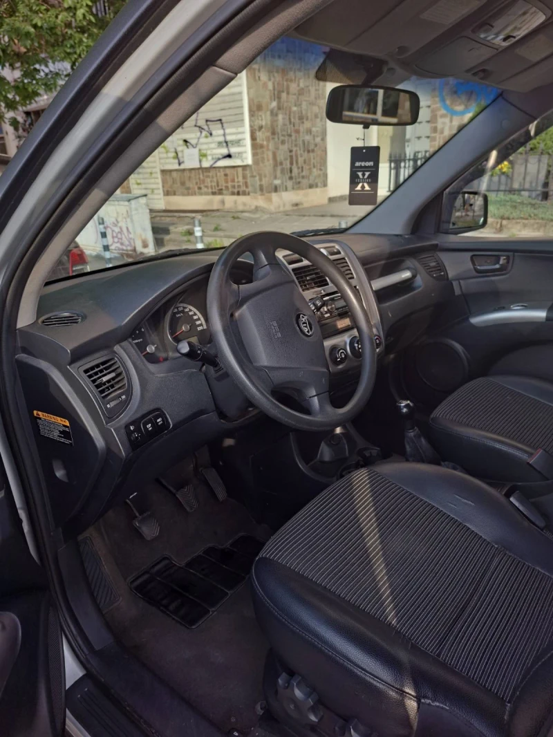 Kia Sportage 2.0 CRDI 4х4, снимка 13 - Автомобили и джипове - 52285473