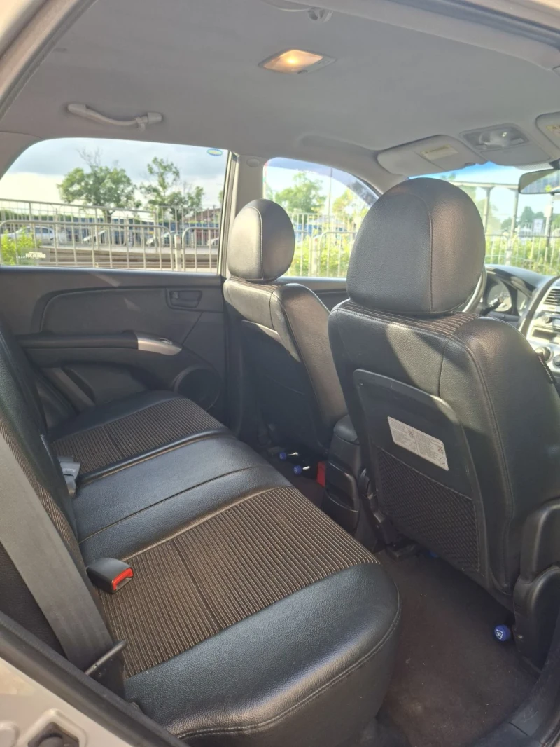Kia Sportage 2.0 CRDI 4х4, снимка 16 - Автомобили и джипове - 52285473