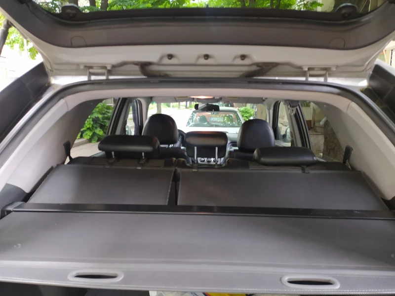 Kia Sportage 2.0 CRDI 4х4, снимка 10 - Автомобили и джипове - 52285473