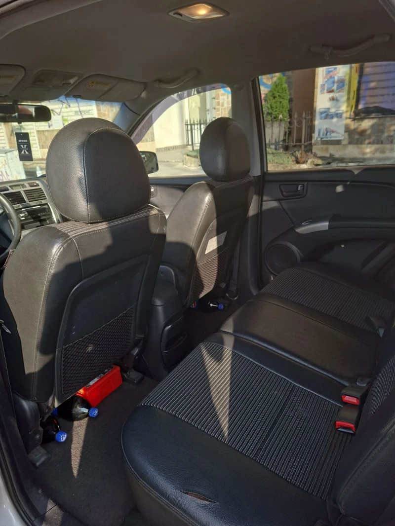 Kia Sportage 2.0 CRDI 4х4, снимка 15 - Автомобили и джипове - 52285473