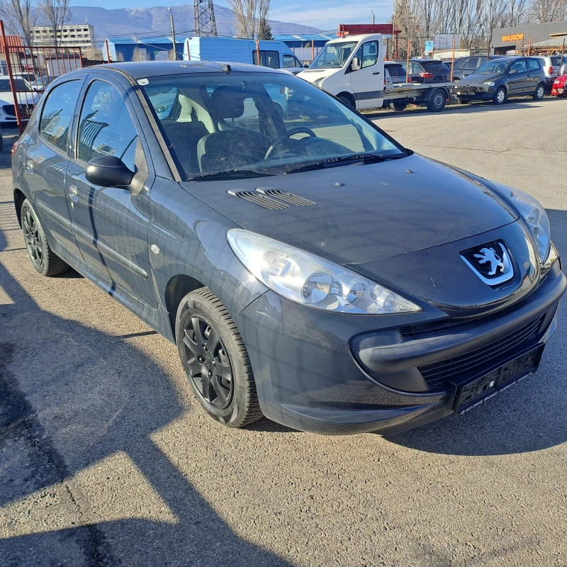 Peugeot 206 1.1 Много запазен автомобил., снимка 16 - Автомобили и джипове - 48163877