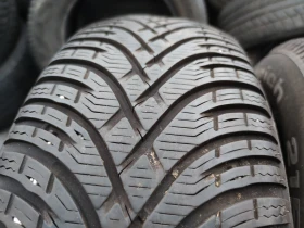 Гуми Зимни 215/65R16, снимка 4 - Гуми и джанти - 47832985