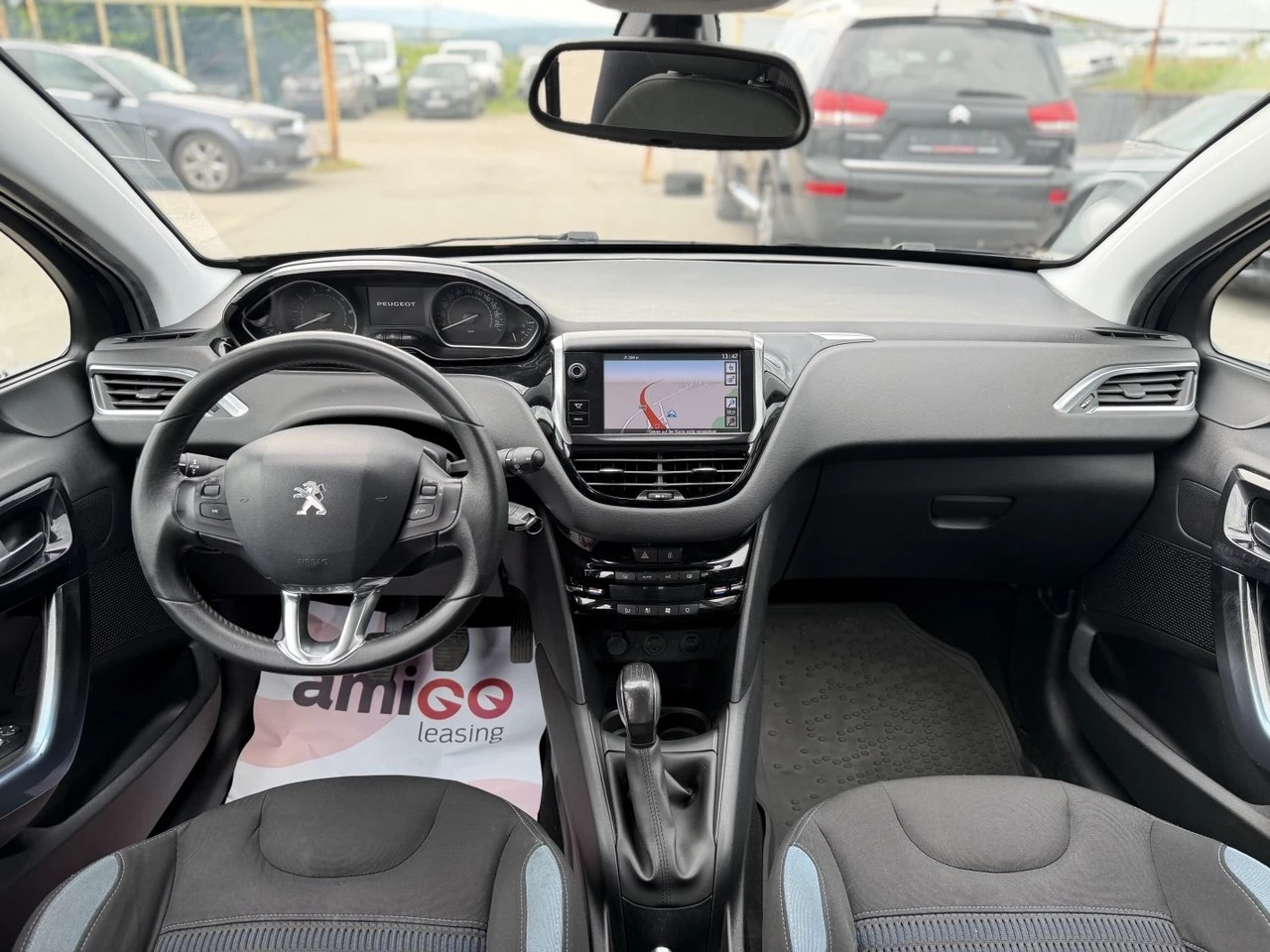 Peugeot 208 1.4i NAVI, снимка 13 - Автомобили и джипове - 55016557