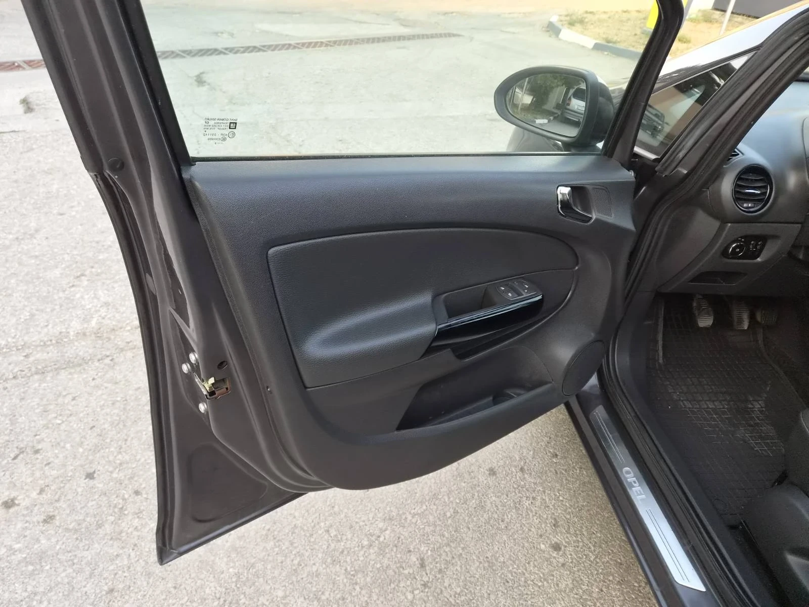 Opel Corsa 1.4i, снимка 15 - Автомобили и джипове - 55779091