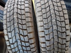 Гуми Зимни 225/65R18, снимка 1 - Гуми и джанти - 46754107