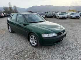 Opel Vectra 1.6i-75PS-КЛИМАТИК - 3800 лв. - 54343763 | Car24.bg