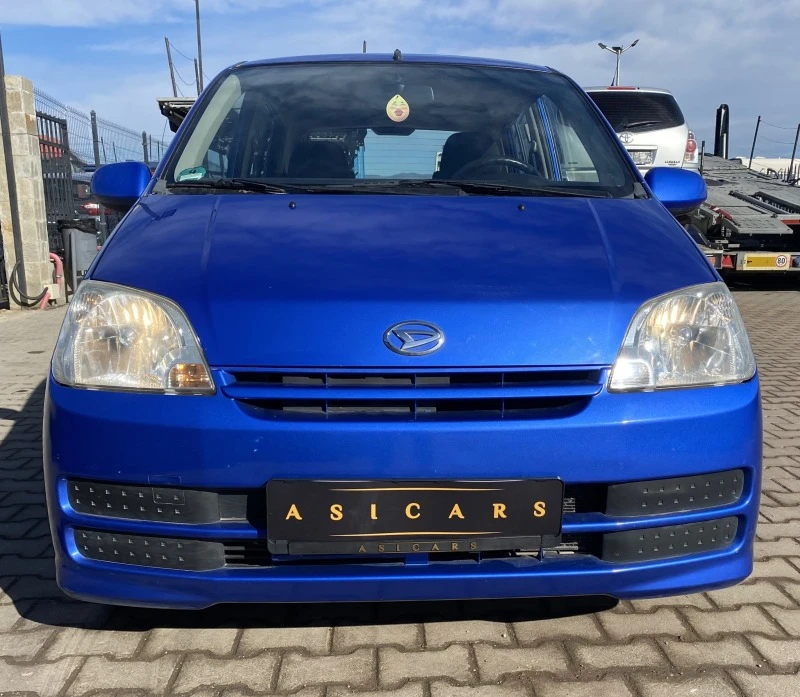 Daihatsu Cuore 1.0I , снимка 8 - Автомобили и джипове - 44144119