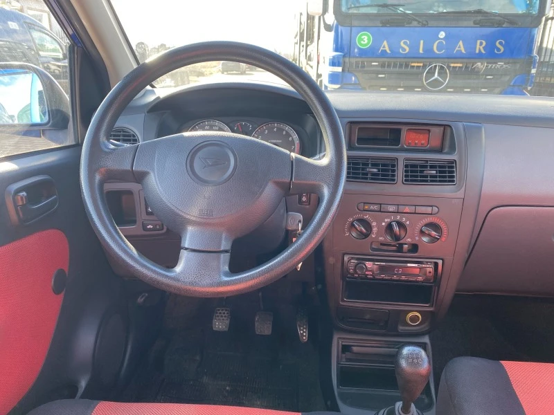 Daihatsu Cuore 1.0I , снимка 13 - Автомобили и джипове - 44144119