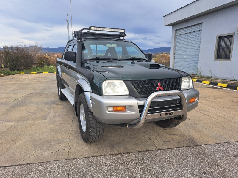 Mitsubishi L200 1.3i 16V Solo, снимка 9 - Автомобили и джипове - 40702260
