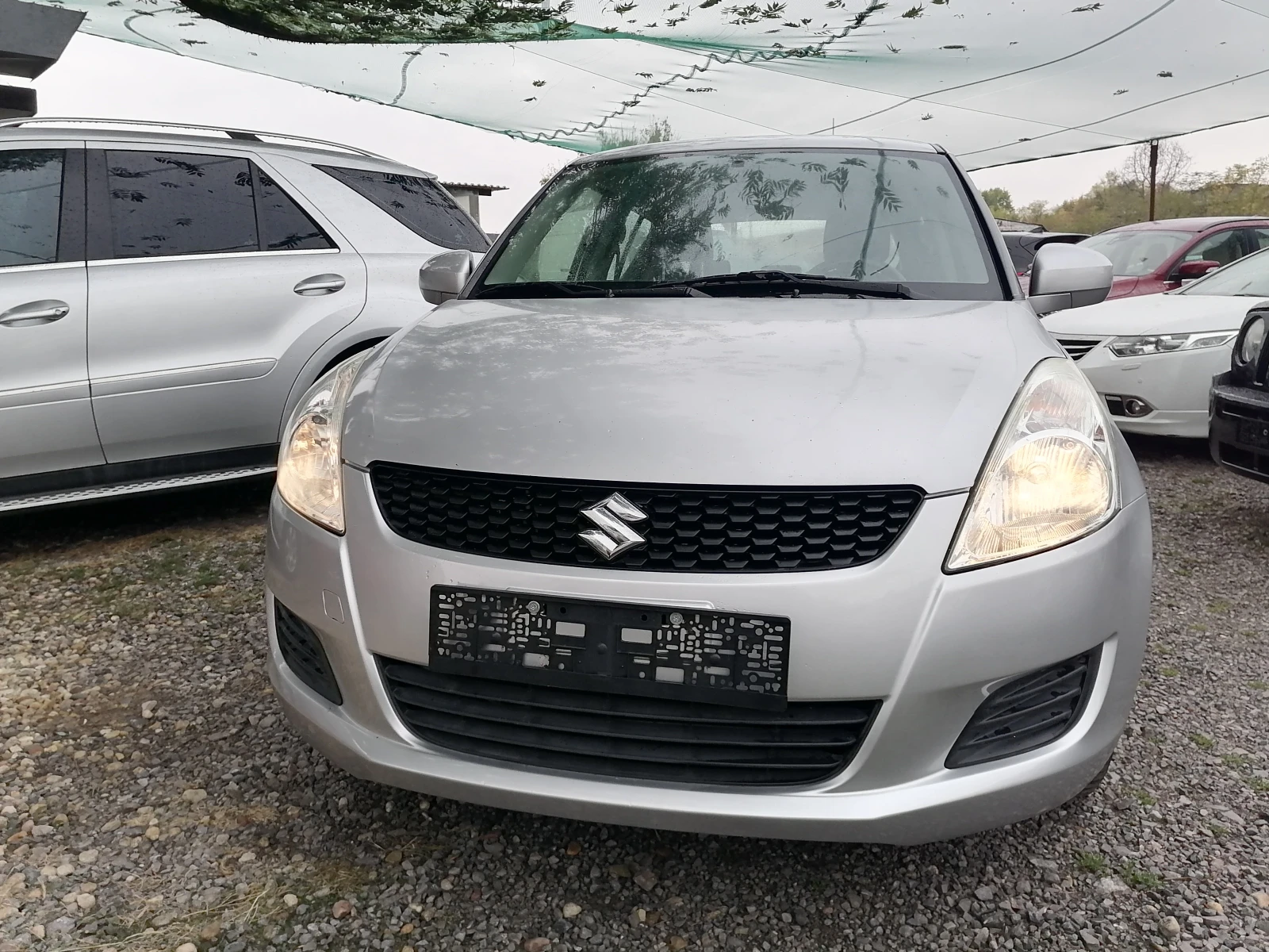 Suzuki Swift 1.2i 4x4 - изображение 7