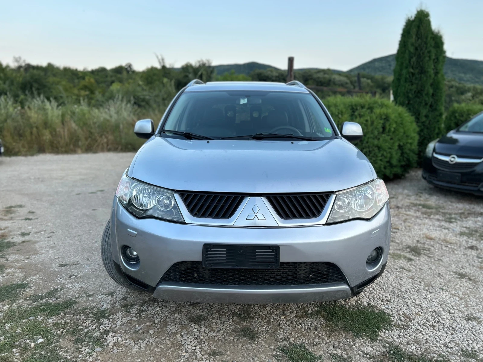 Mitsubishi Outlander 2.0TDi КОЖА 4х4 Keyless Xenon 7м, снимка 2 - Автомобили и джипове - 55559835