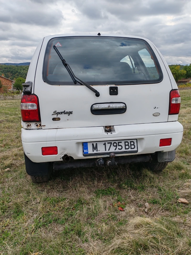 Kia Sportage 2.0, снимка 5 - Автомобили и джипове - 52437984