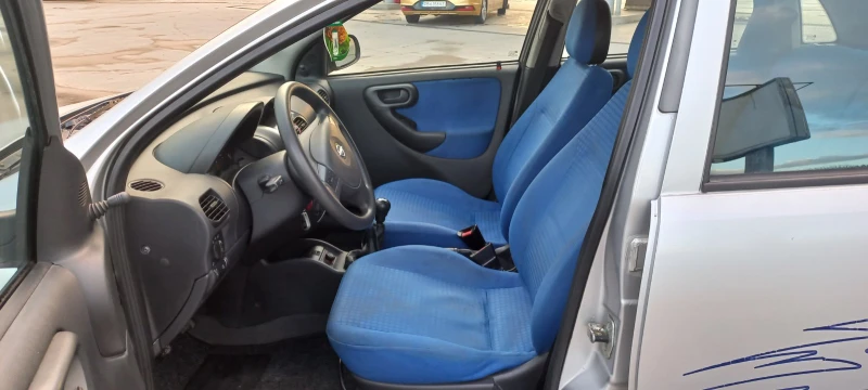 Opel Corsa 1.2 16V, снимка 6 - Автомобили и джипове - 53323344