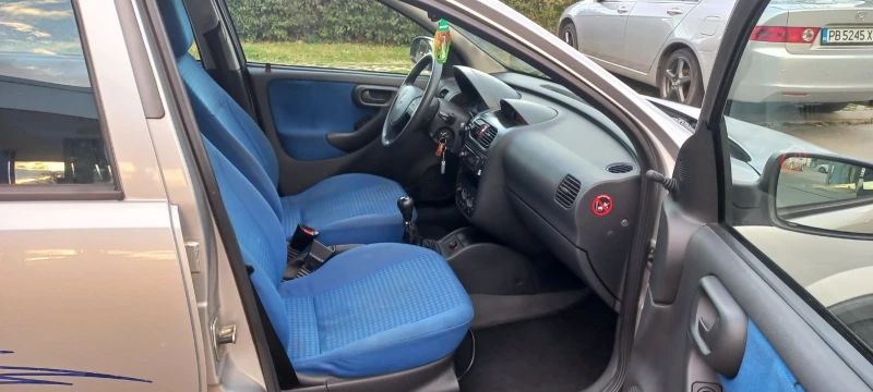 Opel Corsa 1.2 16V, снимка 11 - Автомобили и джипове - 53323344
