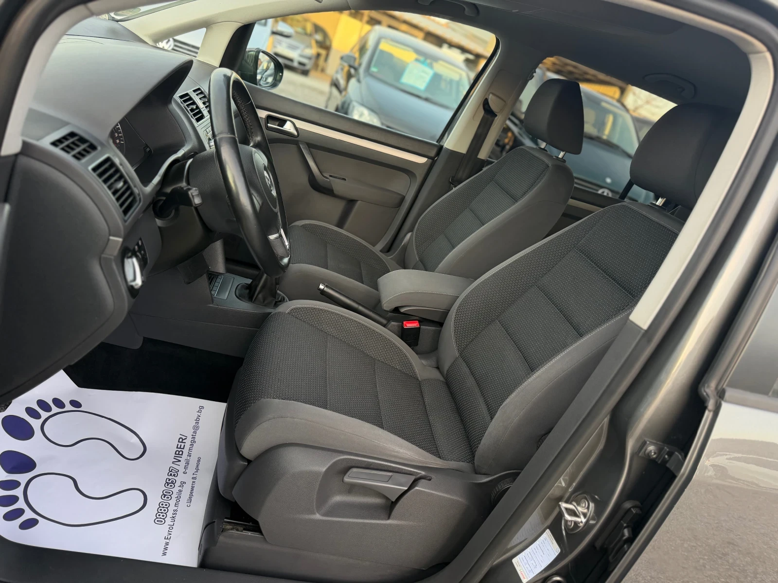 VW Touran 2.0TDI 140кс 6с 7- МЕСТА КЛИМАТРОНИК, снимка 11 - Автомобили и джипове - 53814567
