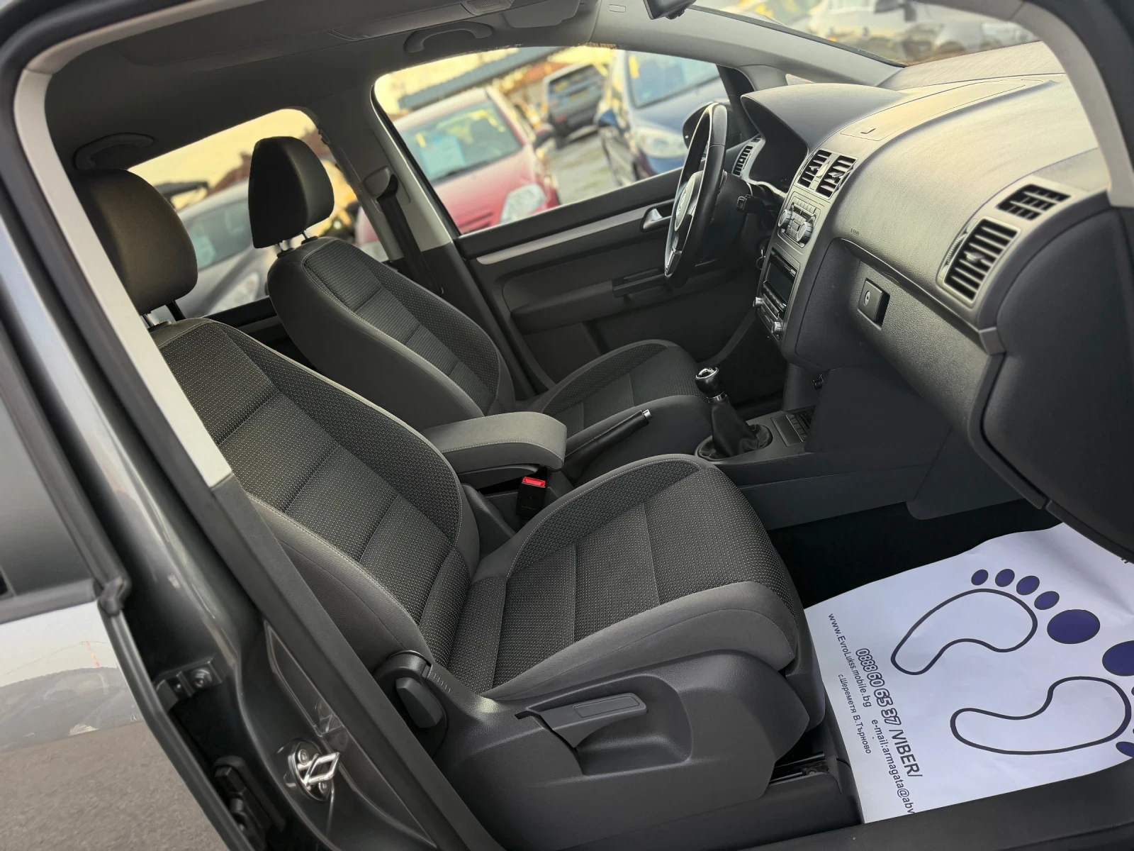VW Touran 2.0TDI 140кс 6с 7- МЕСТА КЛИМАТРОНИК, снимка 14 - Автомобили и джипове - 53814567