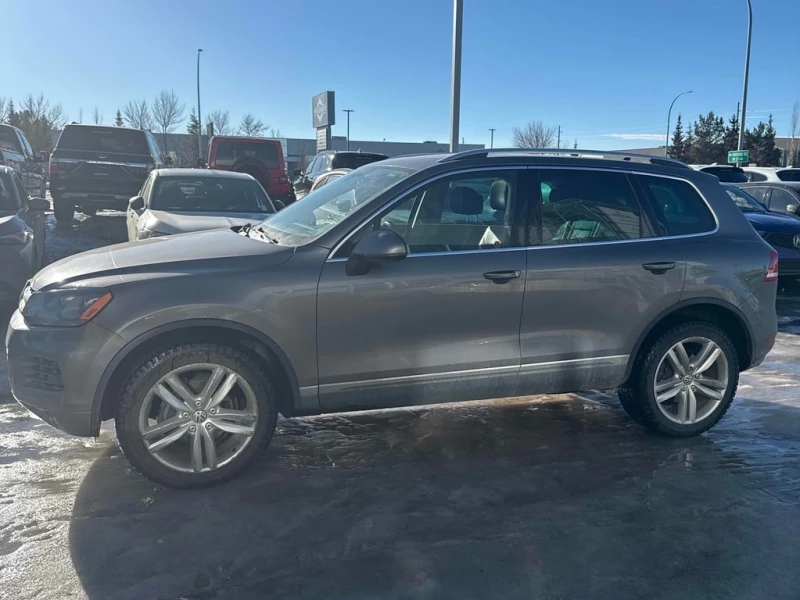 VW Touareg * 4dr TDI * CARFAX * ЦЕНА ДО БГ, снимка 2 - Автомобили и джипове - 53383391