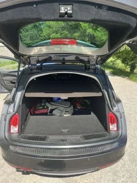 Opel Insignia 2.0 TDCI Sports Tourer, снимка 10