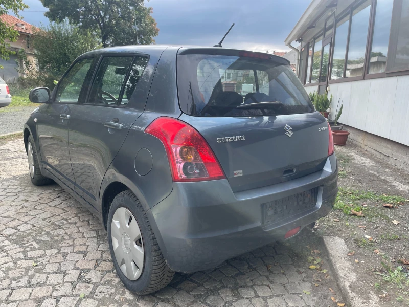 Suzuki Swift 1.3i 4X4, снимка 4 - Автомобили и джипове - 47627740