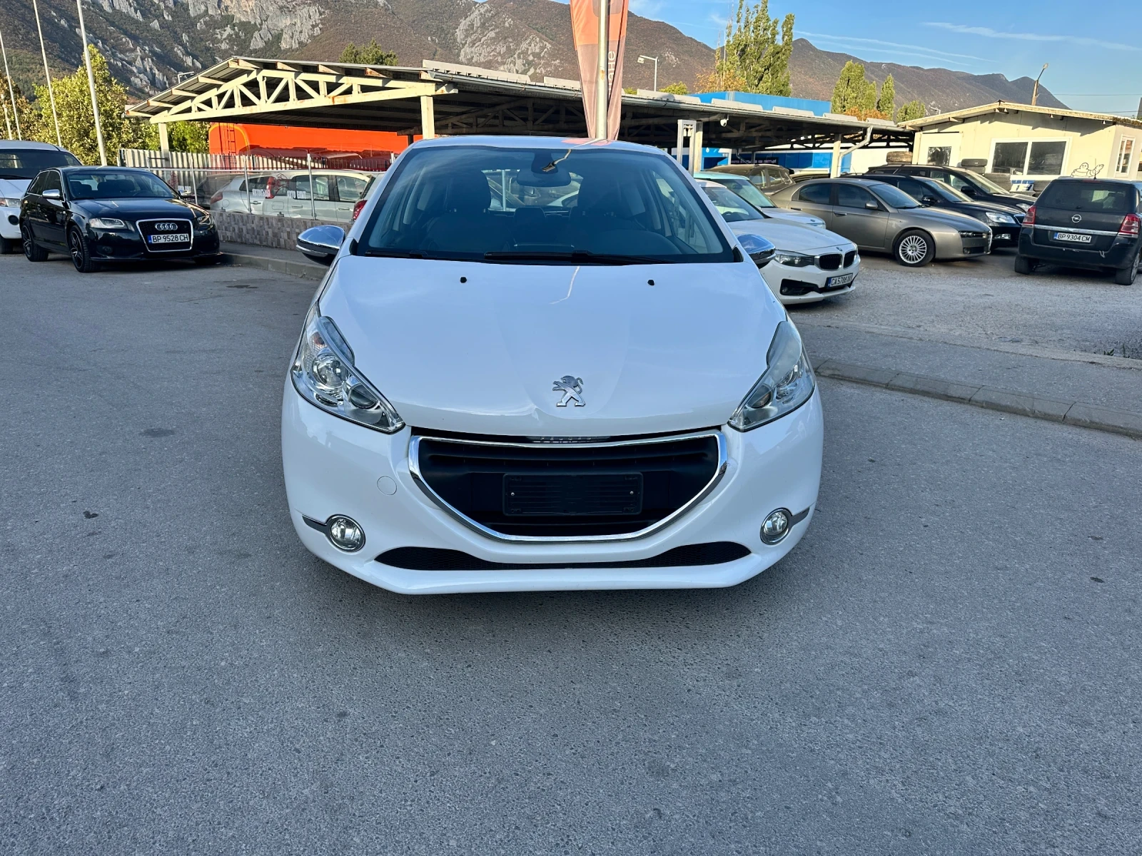Peugeot 208 1.4eHDI - НАВИГАЦИЯ - РЕАЛНИ КИЛОМЕТРИ - УНИКАТ, снимка 2 - Автомобили и джипове - 56124856