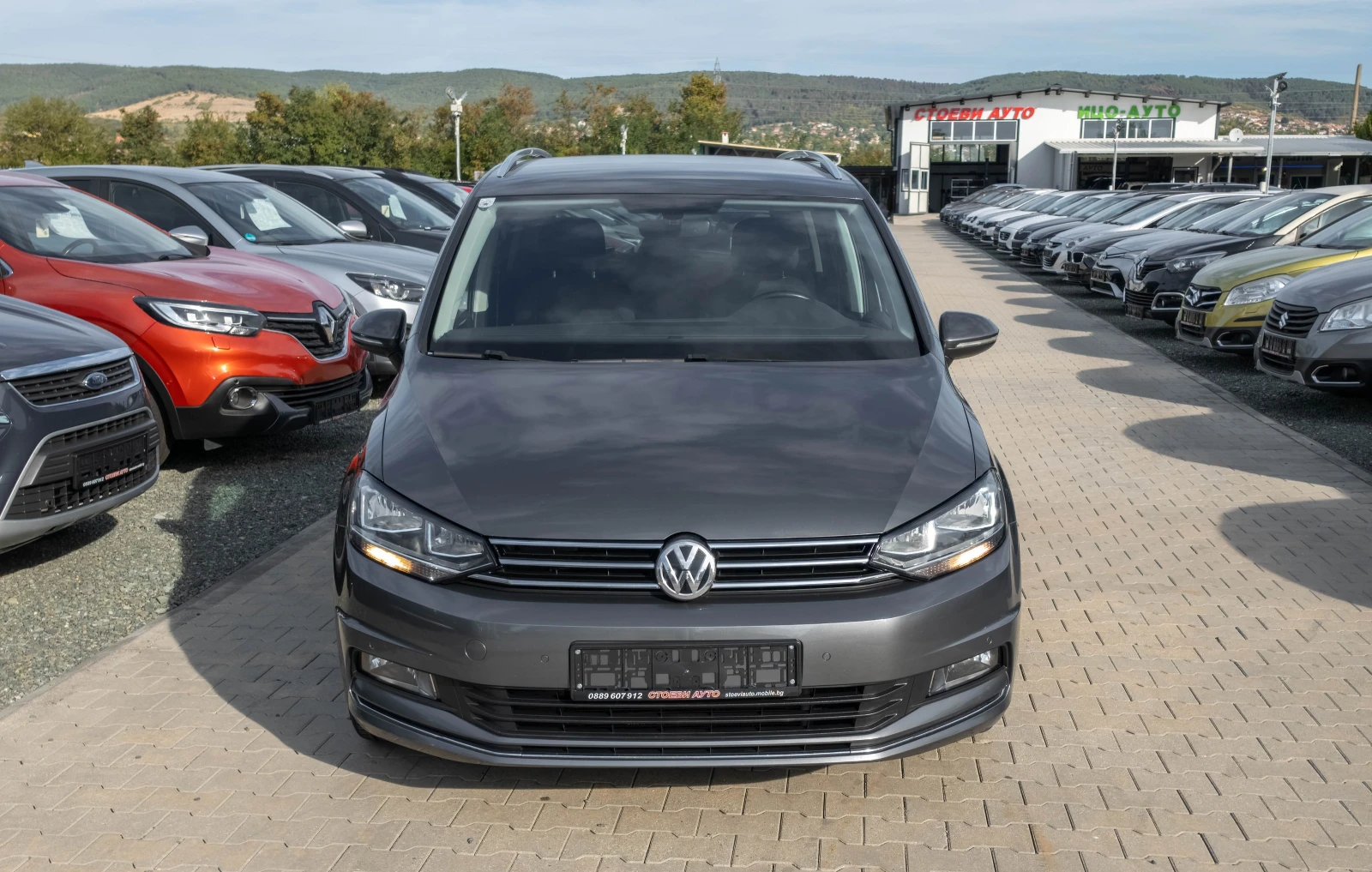 VW Touran 2.0* 150кс* 7места* Нави* , снимка 4 - Автомобили и джипове - 56285905