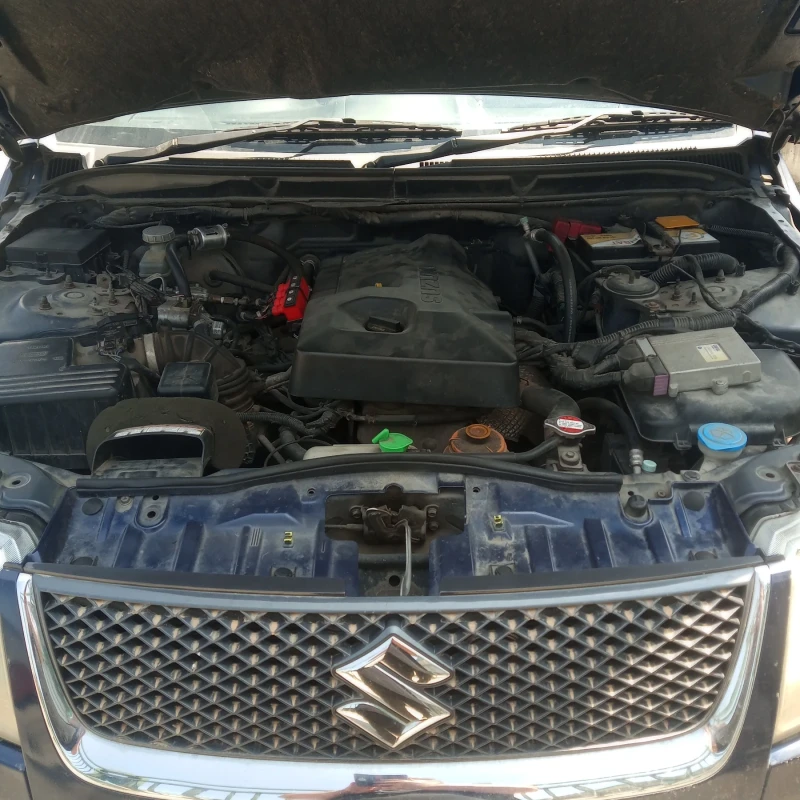 Suzuki Grand vitara 2.0 140кс бензин и газ десен волан, снимка 14 - Автомобили и джипове - 51792700