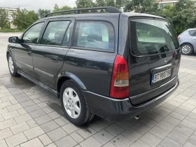 Opel Astra 2.0 DTL, снимка 8 - Автомобили и джипове - 53639958