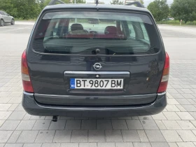 Opel Astra 2.0 DTL, снимка 9 - Автомобили и джипове - 53639958