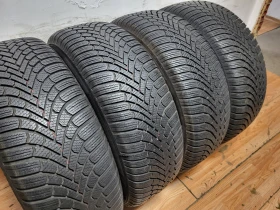 Гуми Зимни 235/60R18, снимка 7 - Гуми и джанти - 52506113
