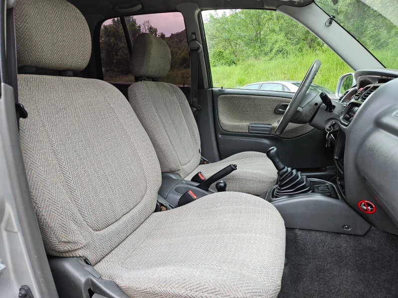 Suzuki Grand vitara 2.0Td KLIMATIK/ITALIA, снимка 12 - Автомобили и джипове - 50256111