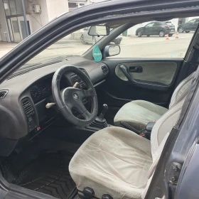 Nissan Primera 1.6 16V Газ/Бензин, снимка 9