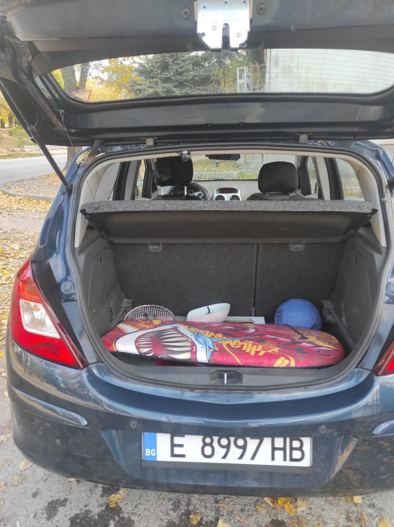 Opel Corsa D, снимка 12 - Автомобили и джипове - 52650416