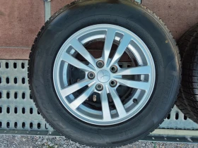 Гуми с джанти Pirelli 215/70R16, снимка 1 - Гуми и джанти - 48471646