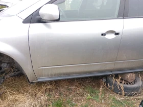 врата лява предна Нисан Мурано 3.5б сиво