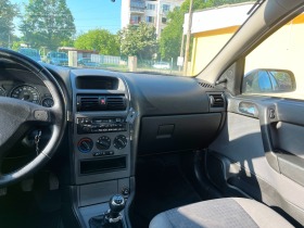 Opel Astra 1.7 CDTI 80 к.с., снимка 9 - Автомобили и джипове - 45421558