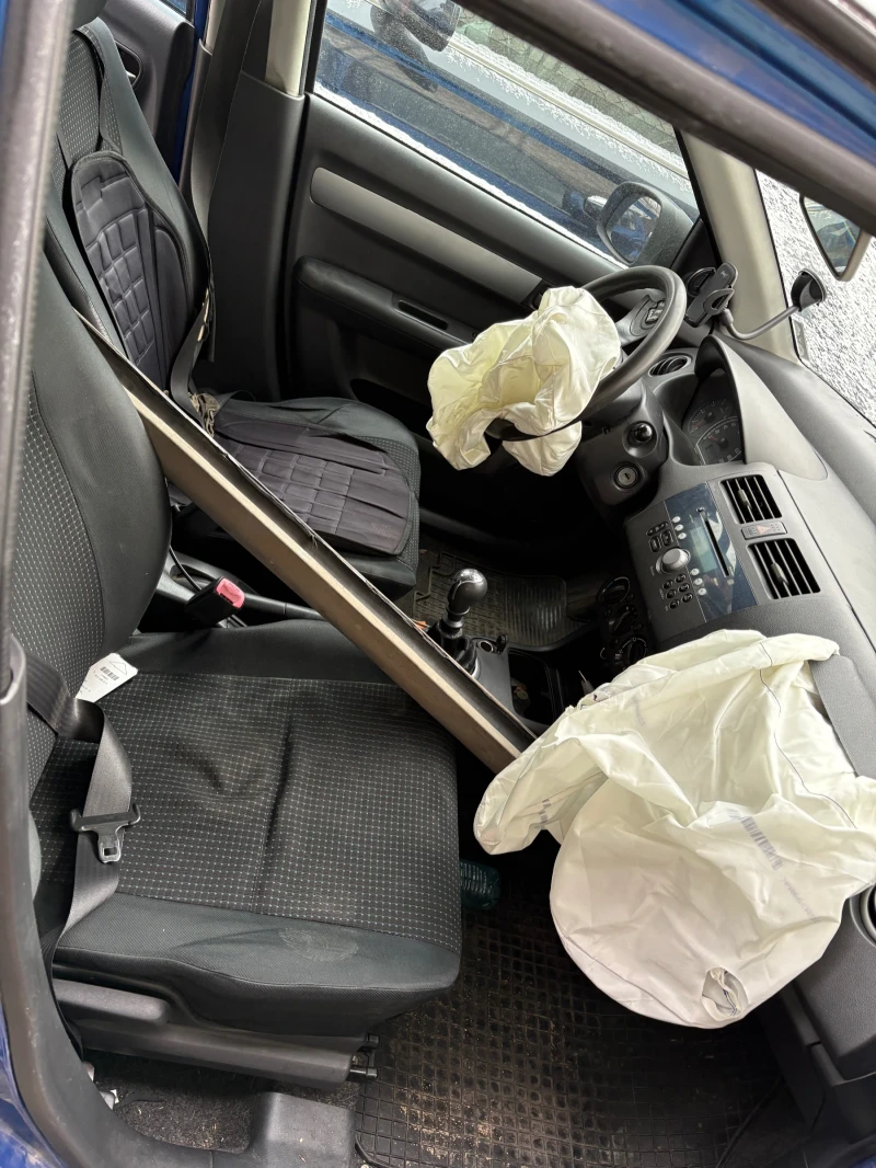 Suzuki Swift 1.3 , снимка 9 - Автомобили и джипове - 53181971