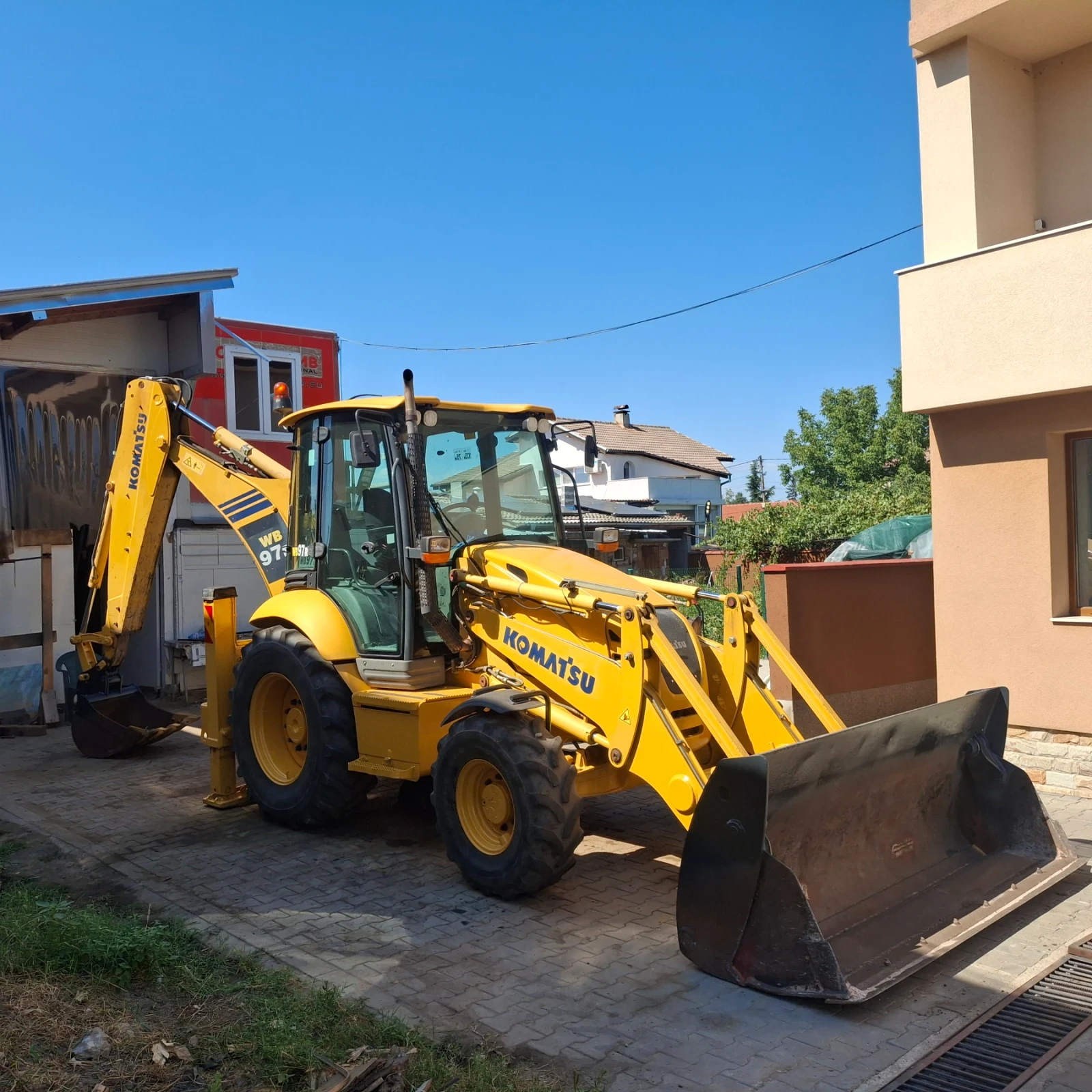 Багер Komatsu WB97-5