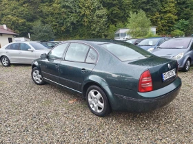 Skoda Superb 2.0 TDi 140 k c. Klimatik - 3999 лв. - 64697207 4